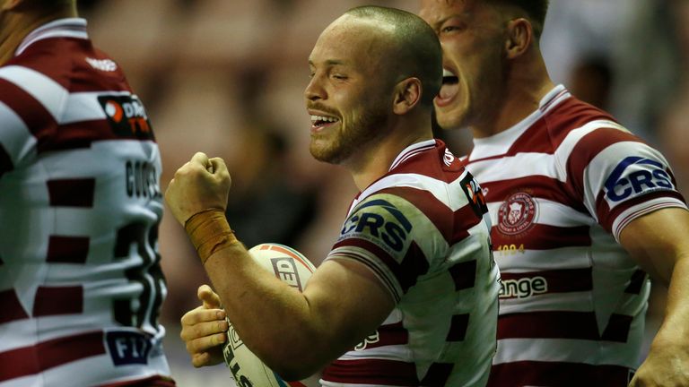 Liam Marshall celebrates a try in Wigan's win over Warrington